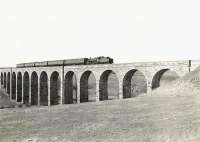 BR Standard class 3MT 2-6-0 77017 crossing Burnton Viaduct on 28 March 1959 with a Dalmellington - Ayr train. <br><br>[G H Robin collection by courtesy of the Mitchell Library, Glasgow 28/03/1959]