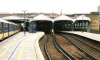 Platform view north at Blackfriars in the summer of 2005, before the station was rebuilt and extended south across the Thames. An early afternoon Luton - Sutton Thameslink train has recently arrived at through platform 4 via the Metropolitan widened lines. The lightly used bay platforms to the right stand vacant.<br><br>[John Furnevel 23/07/2005]