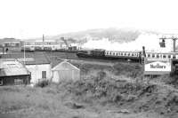 <I>'Welcome to Marlboro Country...'</I>  Preserved A4 Pacific 60009 <I>Union of South Africa</I> with a special heading for Aberdeen in September 1979. The train is about to pass Haymarket shed, with the locomotive alongside the concrete base of the former Haymarket Central Junction signal box.<br><br>[John Furnevel 01/09/1979]