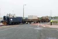 Resident Sentinel 4wDM Shunter H055 (10037/1960) propels two newly delivered flask wagons away from the exchange sidings towards the Heysham Power Stations complex on 26th May 2016. [See image 27587] for a picture of H055's predecessor. NOTE: The power stations are a licensed nuclear site where photography is restricted. This picture of a rarely seen locomotive taken with the kind permission of EDF-Energy and the Civil Nuclear Constabulary.<br><br>[Mark Bartlett 26/05/2016]