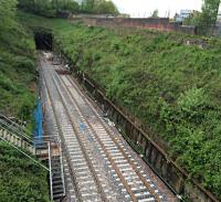 The first of the new slab track peeps out of the Northern portal of the Queen Street tunnel.<br><br>[Martin MacGuire 19/05/2016]