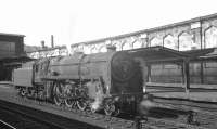 A pleasant summer Saturday afternoon at Carlisle on 7 August 1965. BR light Pacific 72008 <I>Clan MacLeod</I> has just arrived light engine from Kingmoor shed. The locomotive left a little later with the 4.37pm train to Bradford. [See image 32422] <br><br>[K A Gray 07/08/1965]