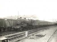 Horwich Mogul 42831 pulls away from Ayr on 6 August 1955 with a Glasgow St Enoch - Girvan train.  <br><br>[G H Robin collection by courtesy of the Mitchell Library, Glasgow 06/08/1955]