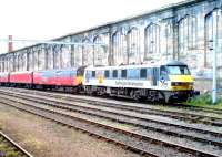 Royal Mail stock stabled alongside the west wall at Carlisle station on 29 May 2002. Locomotive is 90130 <I>Fretconnection</I> in modified BR RfD / SNCF livery. <br><br>[John Furnevel 29/05/2002]