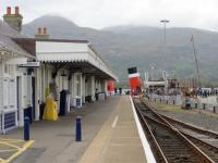 As the PS Waverley tied up at the Railway Pier, Kyle on June 2 2016 there was a nowadays very rare opportunity to take the few steps between platform end and ship’s gangway.  She has here just returned from a cruise advertised as being  or Portree and Gairloch, but which got slightly 'blown off course’, turning back at Raasay for Eigg and Rum.  With the added drama of an impromptu Coastguard Helicopter exercise off Rum, winching a man down onto the deck!<br><br>[Mark Wringe 02/06/2016]