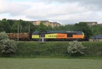 With a muted throb from the Mirrlees Blackstone engine, Colas 60026 gets the twenty wagons of the Carlisle to Chirk log train moving again after a stop in the Up Loop at Oubeck. <br><br>[Mark Bartlett 01/06/2016]