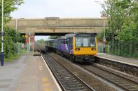 Blackpool Council announced in June 2016 that Crossley's Bridge, at the east end of Layton station, is to be demolished and replaced in a £6.1m scheme due to extensive corrosion. As the bridge needed to be modified for electrification Network Rail are contributing to the cost. The bridge was built in 1931 and the road over it will close after the 2016 illuminations for several months. It is similar in style to two other bridges on the Blackpool South line at Squires Gate and Harrowside. A pair of Pacers rattle through on a Hazel Grove to Blackpool North service on 4th June 2016.  <br><br>[Mark Bartlett 04/06/2016]