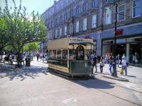 Brisk business for Dundee's vintage Tram on a lovely 31/05/2016. OK, it's a coffee kiosk, but admit it it's pretty well done and you were temporarily fooled. Dundonians are fiercely proud of their heritage, as observed by native James Cameron (the WW2 reporter, not the Hollywood film producer) and will be banging on about their trams long after the last passenger has died.<br><br>[David Panton 31/05/2016]