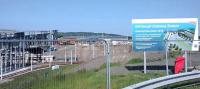 Overview of the site on Sunday 05/06/2016 looking northeast. The tram stop will be at the bottom left, at quite an angle to, and different height from, the rail platforms at the back. Presumably the seemingly dozens of roadsigns pointing to South Gyle station from this area will be removed in favour of signs for Gateway. After all South Gyle is not not an interchange or park and ride and doesn't even have much of a car park!<br><br>[David Panton 05/06/2016]