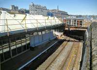 The east end of Platform 1 and the Down loop. Work in association with redevelopment of the area means that the approach to Dock Street tunnel is slightly less gloomy than hitherto. There was once a signal box in the murk beyond the platforms. [See image 32027]<br><br>[David Panton 31/05/2016]