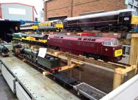 <h4><a href='/locations/S/St._Philips_Marsh'>St. Philips Marsh</a></h4><p><small><a href='/companies/G/Great_Western_Railway'>Great Western Railway</a></small></p><p>One of the smaller exhibits at the recent 40th birthday party for the HST was this display of motive power and stock from the AVWP, near Keynsham. Notice the chap sensibly sheltering from the rain on the left. 67/122</p><p>02/05/2016<br><small><a href='/contributors/Ken_Strachan'>Ken Strachan</a></small></p>