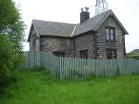 View south from the former trackbed of the Manchester to Sheffield and Wath 1500V DC electrified line, showing the former Hazelhead Station Masters house, now a private residence. The trackbed is now a part of the long distance Trans Pennine Trail.<br><br>[David Pesterfield 01/06/2016]