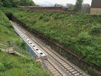 Slab track panels neatly stacked on recently lowered down line at North portal of Queen St tunnel.<br><br>[Martin MacGuire 15/06/2016]