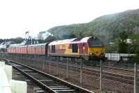 A northbound mail train gets underway on the afternoon of 17 September 2004, following a stop at Aviemore station. The locomotive is EWS 67008.<br><br>[John Furnevel 17/09/2004]