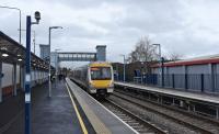 168 312 standing under the new footbridge and lifts waiting to head for<br>
London. [See image 25588] for a similar view 7 years previously.<br><br>[Peter Todd 09/01/2016]