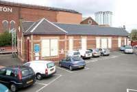 The refurbished and re-roofed main building at Coatbridge Sunnyside in the spring of 2005, with the Lamberton Engineering Works building looking on from the north side of the line.<br><br>[John Furnevel 09/05/2005]