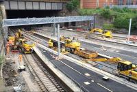 Work at the north ends of the Queen Street platforms continues on 22 June 2016, as the first signals are mounted under the new gantry and tubular masts appear on the platforms.<br><br>[Colin McDonald 22/06/2016]