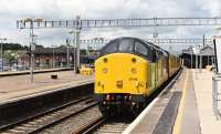 Colas 37s, 37116 & 37219, pause under the newly erected catenary at Didcot on 16 June 2016. After the driver changed ends this Network Rail train headed for Oxford and beyond.<br><br>[Peter Todd 16/06/2016]