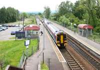 ScotRail 158733 draws to a halt at Bridge of Allan platform 1 on a fine summer afternoon in June 2005 with a Dunblane - Edinburgh service.<br><br>[John Furnevel 24/06/2005]