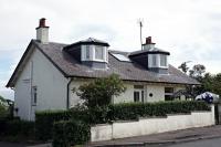 The former house of the stationmaster at Dunure, confusingly at Fisherton. The station was also here, a fair distance from and height above Dunure. The trackbed nowadays is just a jungle and completely inaccesible. Under it all is the island platform - totally lost amongst the trees and shrubs. Photograph taken on 17 June 2016 showing what is now 'Station House'.<br><br>[Colin Miller 17/06/2016]