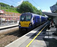 A 344 for Helensburgh pulls in on 25/06/2016. Station improvements are in progress.<br><br>[David Panton 25/06/2016]