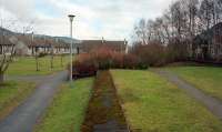 View east from the platform end at Ballater showing the trackbed now largely occupied by housing.<br><br>[Ewan Crawford 04/02/1997]