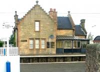 The pedestrian entrance to Kirknewton station from Station Road in September 2002. The  memorable 1848 'B' listed station building alongside the eastbound platform opposite is now a private residence. [See image 13927]<br><br>[John Furnevel 03/09/2002]