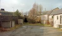 The short tunnel at the west end of the former Aboyne station in February 1997. The west signal box (closed 1920) was located to the left at the end of the westbound platform so the signal box looking building, a shop accessed from station square, on the distant right is intriguing.<br><br>[Ewan Crawford 04/02/1997]