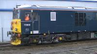 73969 exits Brodie yard with two refurbished coaches for attachment to the consist in the long lyes.<br><br>[Ken Browne 18/03/2016]