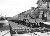 A train for Bridgeton waits to leave Balloch Central on 20 April 1957 behind V1 67601. <br><br>[G H Robin collection by courtesy of the Mitchell Library, Glasgow 20/04/1957]