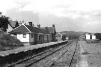 Scene at Boat of Garten station in the summer of 1972 looking towards Grantown along the weed strewn track. The track unfortunately only went a further few hundred yards to the north, both the ex HR and GNSR lines having been recovered by the scrapman.<br><br>[John McIntyre /07/1972]