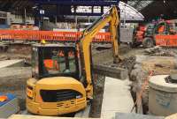 Foundations for the south extensions to platforms 2-5 have now been laid in the excavated former concourse area. In the background some of the new masts for the overhead electrification can be seen.<br><br>[Colin McDonald 04/07/2016]