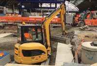 Foundations for the south extensions to platforms 2-5 have now been laid in the excavated former concourse area. In the background some of the new masts for the overhead electrification can be seen.<br><br>[Colin McDonald 04/07/2016]