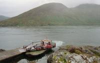 The 'Glenachulish', the last Scottish ferry with a turntable deck, prepares to leave the Glenelg Slip in august 1993. The turntable will turn such that the cars do not need to reverse on arrival at Kylerhea in Skye. Skye is just across the water.<br><br>[Ewan Crawford /08/1993]
