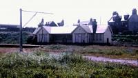 View south over Cullen's goods yard towards the single platform passenger station in July 1973.<br><br>[Alan Norris 05/07/1973]