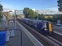 Westbound 380006 draws to a stop at Bishopton.<br><br>[Ewan Crawford 12/07/2016]