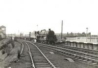 Standard class 5 4-6-0 73103 runs into Troon on 28 March 1959 with an Ayr - Glasgow train. <br><br>[G H Robin collection by courtesy of the Mitchell Library, Glasgow 28/03/1959]