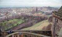 View from Edinburgh Castle of the Edinburgh and Glasgow Railway passing through Princes Street Gardens with Waverley station in the distance. Disappointingly no trains are passing and only a single Sprinter is at the station.<br><br>[Ewan Crawford //1993]