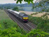 47832 and 47854 climb away from Inverkeithing East Junction and towards Dalgety Bay with SRPS empty stock to Aberdeen for the following day's excursion to Kyle of Lochalsh.<br><br>[Bill Roberton 09/07/2016]