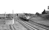 The 0905 London St Pancras - Glasgow Central <I>Thames - Clyde Express</I> takes the GSWR route at Gretna Junction on 1 July 1972, hauled by the usual Peak Type 4 locomotive.  <br><br>[Bruce McCartney Collection 01/07/1972]