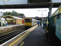 Here at Aintree the signs saying 'Alight here for Aintree' are, can I suggest, superfluous. An Ormskirk service calls on 29/06/2016.<br><br>[David Panton 29/06/2016]