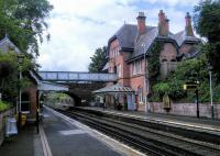 The attractively maintained station in the leafy suburb of Cressington.<br><br>[David Panton 29/06/2016]