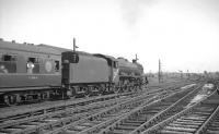 Jubilee 45698 <I>Mars</I> leaves Carlisle on 17 July 1965 with the combined 2pm ex Glasgow Central, 2.5pm ex Edinburgh Princes Street, with through coaches for Manchester and Liverpool.<br><br>[K A Gray 17/07/1965]