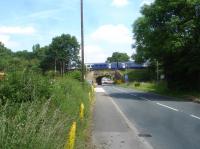 A grab shot of a Northern Rail class 158 crossing the soon to be replaced arched Haigh Lane bridge as it heads for its next stop at Wakefield Kirkgate on the 10.18 ex Nottingham to Leeds fast limited stop service.<br><br>[David Pesterfield 23/06/2016]