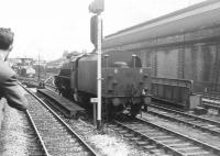 A special passing Manchester Exchange about to run into Manchester Victoria with a Black 5 waiting on the approach lines. The date is thought to be 1 June 1968 and the train <I>BR (Scottish Region) Grand Tour No 5</I>, originating from Edinburgh Waverley and hauled from Carnforth by 70013 <I>Oliver Cromwell</I>. In which case the Black 5 is likely to be 44884, which provided banking assistance to the special out of Manchester Victoria. [Ref query 5187]<br><br>[Bruce McCartney Collection 01/06/1968]