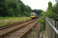 A Class 185 unit heads away from the camera towards Barrow-in-Furness as it passes the site of Furness Abbey station on 11 July 2016. The station closed to passengers in 1950 and all traces of it have gone.<br><br>[John McIntyre 11/07/2016]