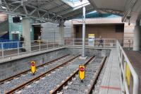 <I>Future proofing?</I> The Manchester Airport tram link was originally envisaged as a loop line from Wythenshawe. The line as opened is a long branch and the rest of the loop isn't in current construction plans but, as this picture of the tram platforms at the airport shows, the line could easily be extended in the future.<br><br>[Mark Bartlett 17/06/2016]