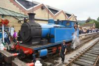 Barclay 0-6-0T no 1245 pauses at the buffer stop at Lakeside station on 10 July 2016 whilst the fireman walks forward to unlock the groundframe.<br><br>[John McIntyre 10/07/2016]