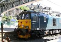 <h4><a href='/locations/E/Edinburgh_Waverley'>Edinburgh Waverley</a></h4><p><small><a href='/companies/N/North_British_Railway'>North British Railway</a></small></p><p>Sleeper locomotive 73970 seems to have struggled to find a bit of shade in the bay at the east end of Waverley on 19 July 2016, the hottest day of the year so far. 42/42</p><p>19/07/2016<br><small><a href='/contributors/John_Furnevel'>John Furnevel</a></small></p>