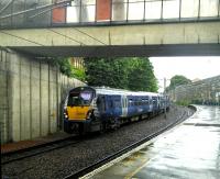 334 031 skulks in the siding ready to return to the running lines. I'm guessing it was from a westbound service terminated at Anderston due to late running.<br>
<br>
<br><br>[David Panton 27/06/2016]